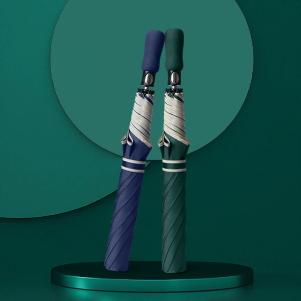 Custom 2-fold automatic folding umbrellas, showcasing premium navy and forest green travel options for corporate promotional gift wholesale by the manufacturer.