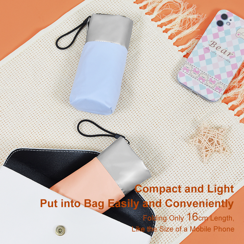 Custom flat mini umbrella measuring only 16cm when folded, demonstrating its ultra-compact size by fitting perfectly into a small handbag. Blueprint Umbrella Co. manufactures these lightweight pocket umbrellas ideal for beauty and fashion brands, offering 2-hour free design services and flexible MOQ for premium B2B corporate promotional gifts.