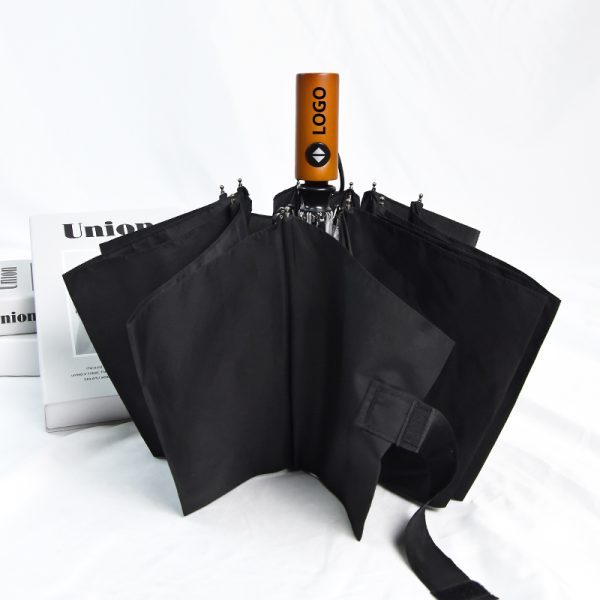 Custom automatic 3-fold self-standing umbrella product shot, showcasing promotional logo printing on a wooden handle from a China manufacturer for wholesale.