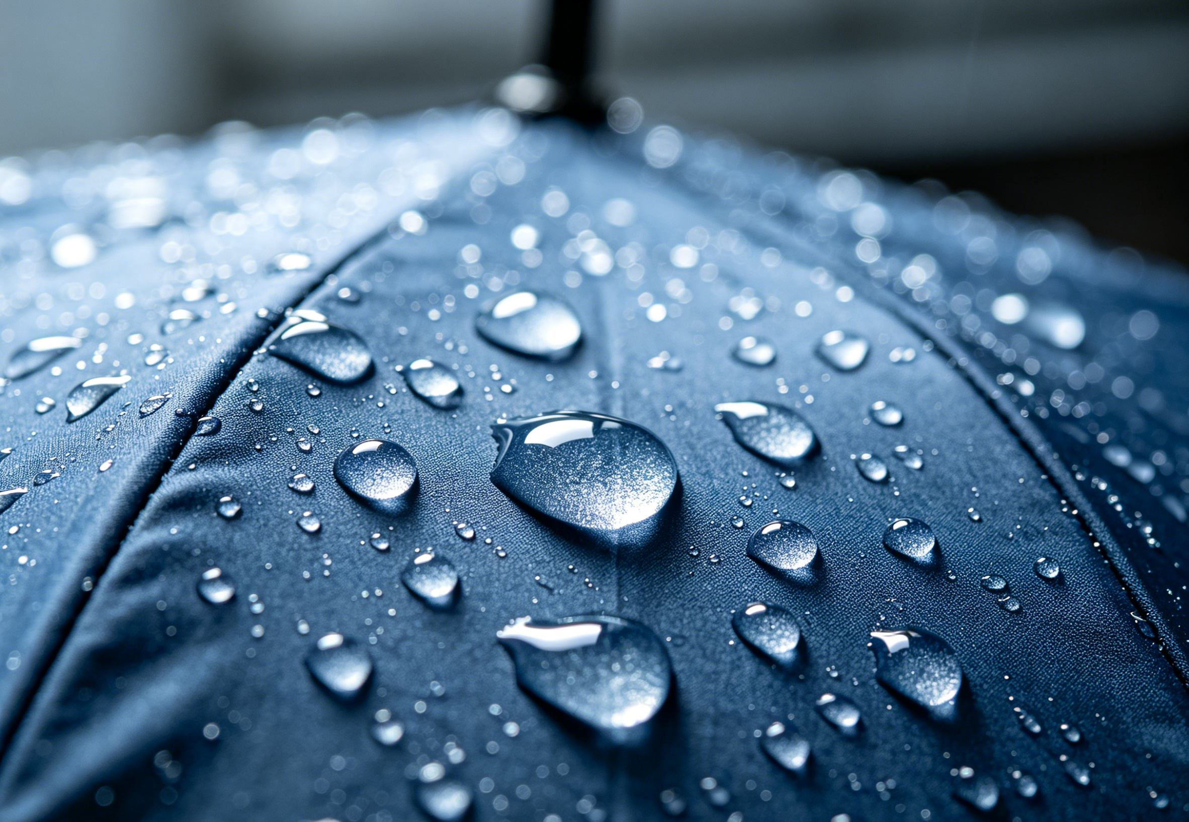 Eco-friendly C0 DWR coating water repellency test on a sustainable umbrella manufacturer's fabric