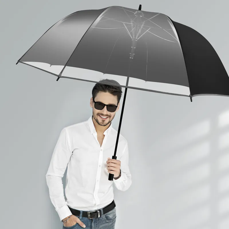 Custom transparent panel stick umbrellas for executive lifestyle branding, showcasing a creative semi-transparent and black golf umbrella option provided by the manufacturer for luxury car handovers, fashion retail, and corporate promotional gift wholesale.